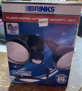 7062w Brinks 039208995603 1 New 180-degree 2-head Motion Activated Security Light White