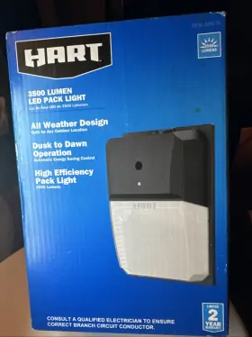 90-1250-35 Hart 3500 Lumens Hardwire Pack Light With Clear Lens Cover Dusk To Dawn Black
