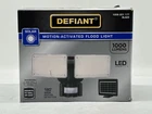 Defiant Solar Powered Outdoor 2-HEAD Led Security Flood Light 1000 Lumens Open. Price: $34.99.