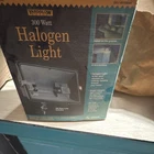 Yardglow 300W Halogen Outdoor Flood Light, Black, Weather Resistant Used. Price: $25.00.