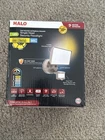 Halo FGS60CLMTNB 200W Eq, 6000 Lumen Led Motion Sensor Flood Light, Bronze Open. Price: $9.99.
