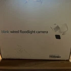 Blink Floodlight Camera BFM00100UW White Hardwired Outdoor Open. Price: $40.00.