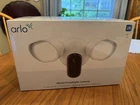 Arlo Wired Floodlight Camera Home Security With 2K Video Sealed New. Price: $110.00.