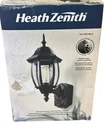 Heath Zenith HZ-4192-BK-G Motion Sensor Outdoor Wall Lantern Light-new-scratch Open. Price: $44.99.