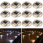 Agptek Solar Driveway Lights Outdoor 12 Pack, Warm White & Cool New. Price: $138.99.