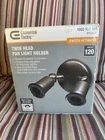 Commercial Electric Twin Head Bronze Outdoor Flood Security Lighting New. Price: $15.00.