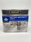Defiant Wired 110 Degree Detection Outdoor Grey Motion Activated Security Light Open. Price: $14.99.