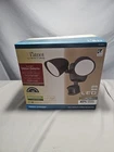 Duel Head Motion Detector Light- Bronze Finish-new Patriot Lighting. Price: $25.00.