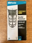 Woods 150W Incandescent Weather Industrial Light, Wall/flush-mount New. Price: $20.00.