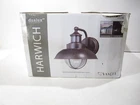 Vaxcel One Light Motion Sensor Outdoor Wall Sconces - Harwich Dualux 8.25" Open. Price: $62.95.