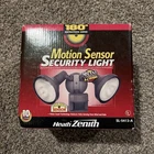 Heath Zenith Motion Sensor Security Light SL-5412-BZ-A Open. Price: $19.99.