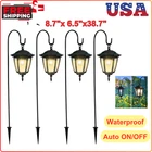 4 Packs Solar Hanging Lanterns With Shepherd Hooks, Waterproof Led Garden Lights New. Price: $51.75.