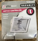 #0384284 Flood Light Utilitech Security Switch-controlled White New. Price: $18.00.