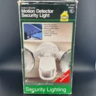 Woods Outdoor Motion Security Light New. Price: $14.99.