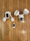 Ring Camera Flood Light Bundle - 3 Pieces Wired And Battery White Used. Price: $399.99.