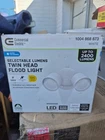 Commercial Electric Dusk Dawn Sensor White Twin Head Led Security Flood Light Open. Price: $25.00.
