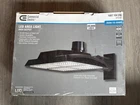 Commercial Electric 400W Integrated Led Bronze Area Light, 21K Lumens New. Price: $174.01.
