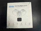 Blink Wired Floodlight Smart Security Camera, 2600 Lumens, Hd Live Sealed Open. Price: $40.00.