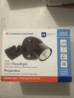 Lithonia Lighting 150-WATT Eq Led Dark Bronze 2-HEAD Dusk-to-dawn Flood New. Price: $49.50.