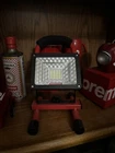 Supreme Cordless Floodlight Lamp Red FW16 New. Price: $189.00.