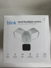 Blink Wired Floodlight - Smart Security Camera, 2600 Lumens, White New. Price: $50.00.