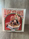 Vintage Enesco Visit With Santa Music Box W/ Motion & Lights Working New. Price: $130.00.