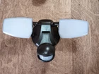 Halo 180-DEGREE Bronze Motion Activated Outdoor Integrated Led Flood Light Open. Price: $32.50.