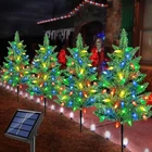 Windpnn Upgraded 4-PACK Solar Christmas Garden Stake Lights, Multi-color New. Price: $42.02.