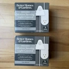 Better Homes & Gardens 4 Motion Sensing Light Control New Indoor Outdoor Lot 2. Price: $24.99.