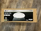 Commercial Electric 14" White Multi Lumen 35,000 High Bay Light Open. Price: $79.00.
