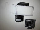 Defiant 180 Black Motion Solar Powered Outdoor 2-HEAD Led Security Flood Light Open. Price: $29.95.