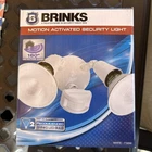 Brinks 180-DEGREE -2 Head Motion Activated Security Light White Open. Price: $14.99.