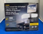 Koda Motion Activated Solar Led Floodlight, Weather Resistant, 2000 Lumens Used. Price: $33.99.