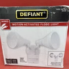 Defiant 180 Degree White Motion-sensing Outdoor Security Light Open. Price: $22.00.