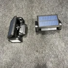 Avjone 74 Led Solar Motion Sensor Flood Lights Open. Price: $14.99.