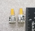 Lot Of (2) Halco 81999 JC2/830/OMNI/IP65/LED 2W G4 Bi-pin Base 10-15V Bulb New. Price: $14.00.