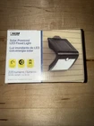 Feit Led Motion-sensing Solar Powered Black Security Floodlight New. Price: $29.99.