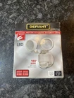 Defiant 180 Wired Led Motion-activated Security Flood Light, White, 1250 Lumens Open. Price: $39.99.
