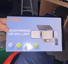 Hykoont Solar Led Outdoor Wall Light, Motion Sensor, Remote Control, IP65 New. Price: $31.40.