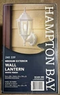 Hampton Bay 14 In. 1-LIGHT White Hardwired Dusk-to-dawn Outdoor Wall Lante New. Price: $39.99.