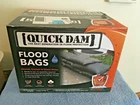 Box Of Quick Dam (QD1224-20) Flood Bags Absorb, Contain & Divert Water Used. Price: $95.00.